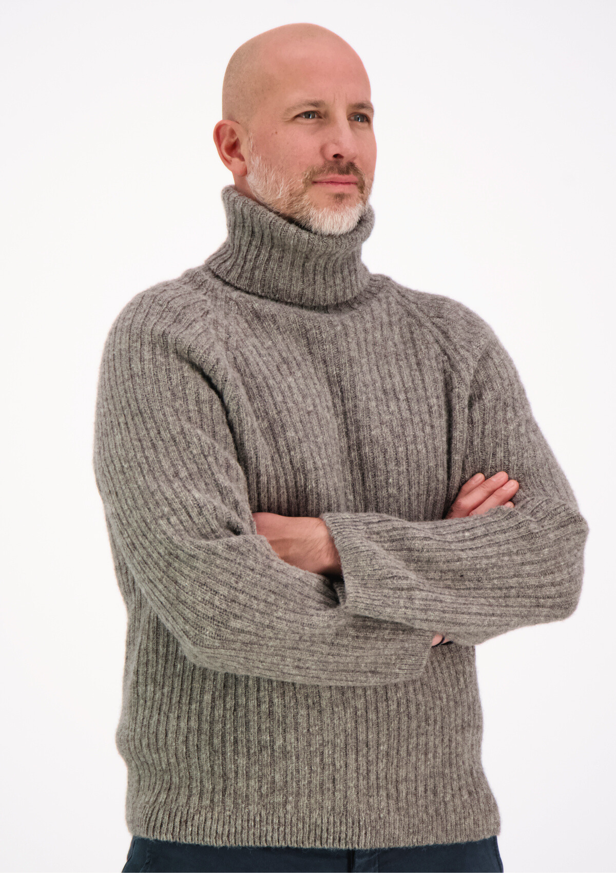 Ribbed grey polo made from Finnish durable sheep wool. Sustainable and warm wool knit made in Finland. 