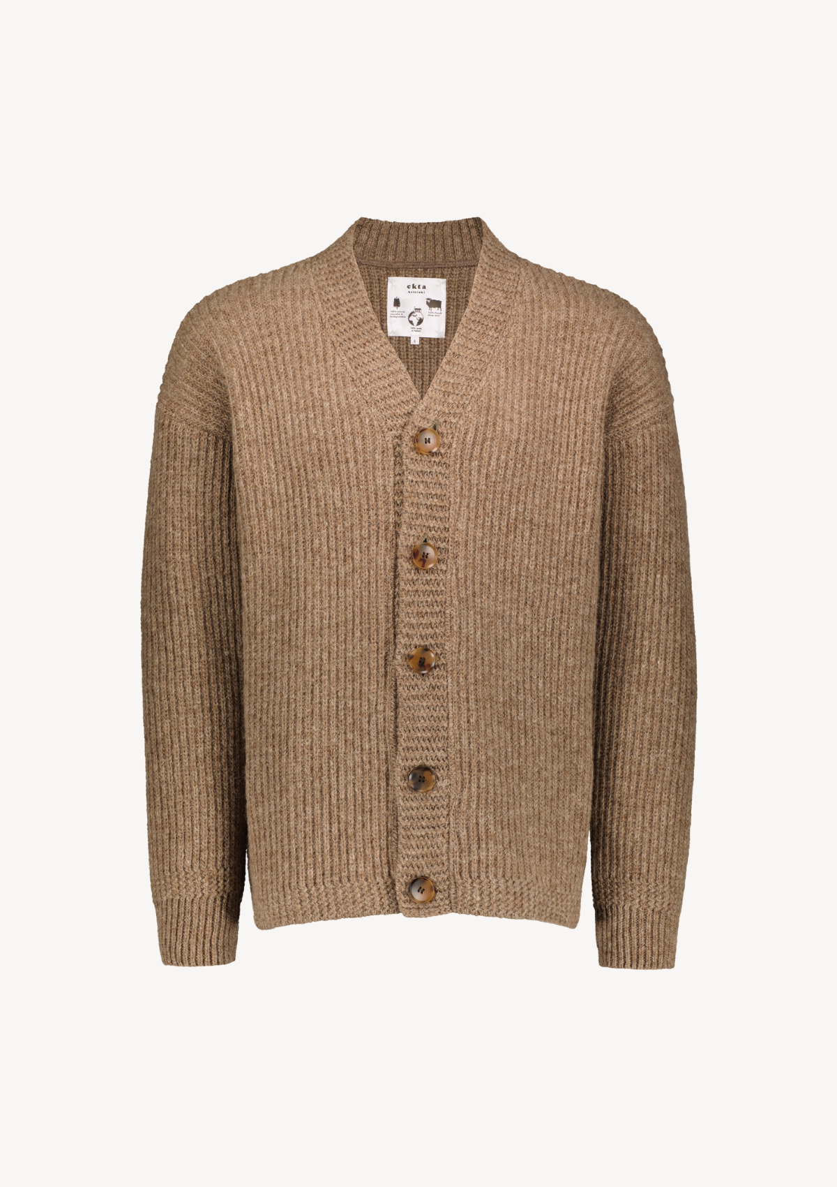 Ribbed longer beige cardigan with relaxed fit. Made of responsbile Finnish sheep wool in Finland. 