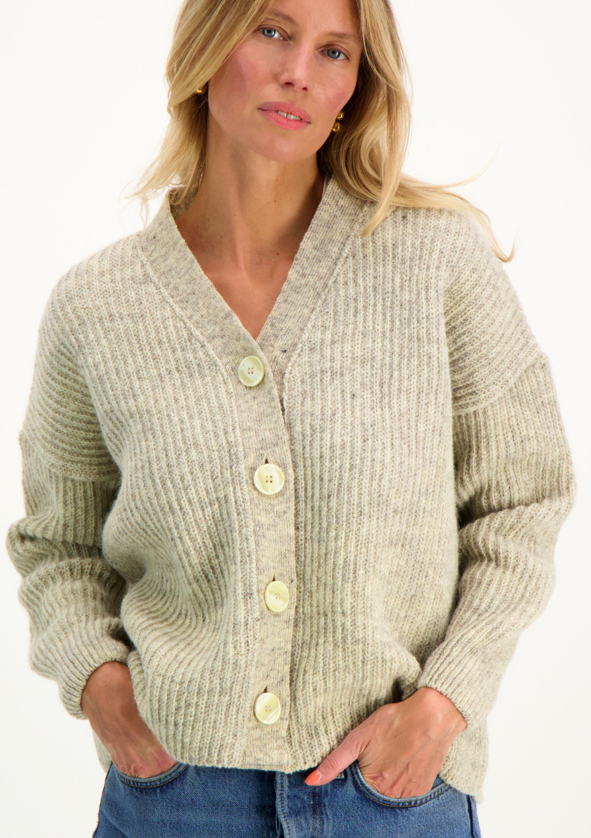 Light grey cardigan responsibly made in Finland from Finnish sheep wool. 