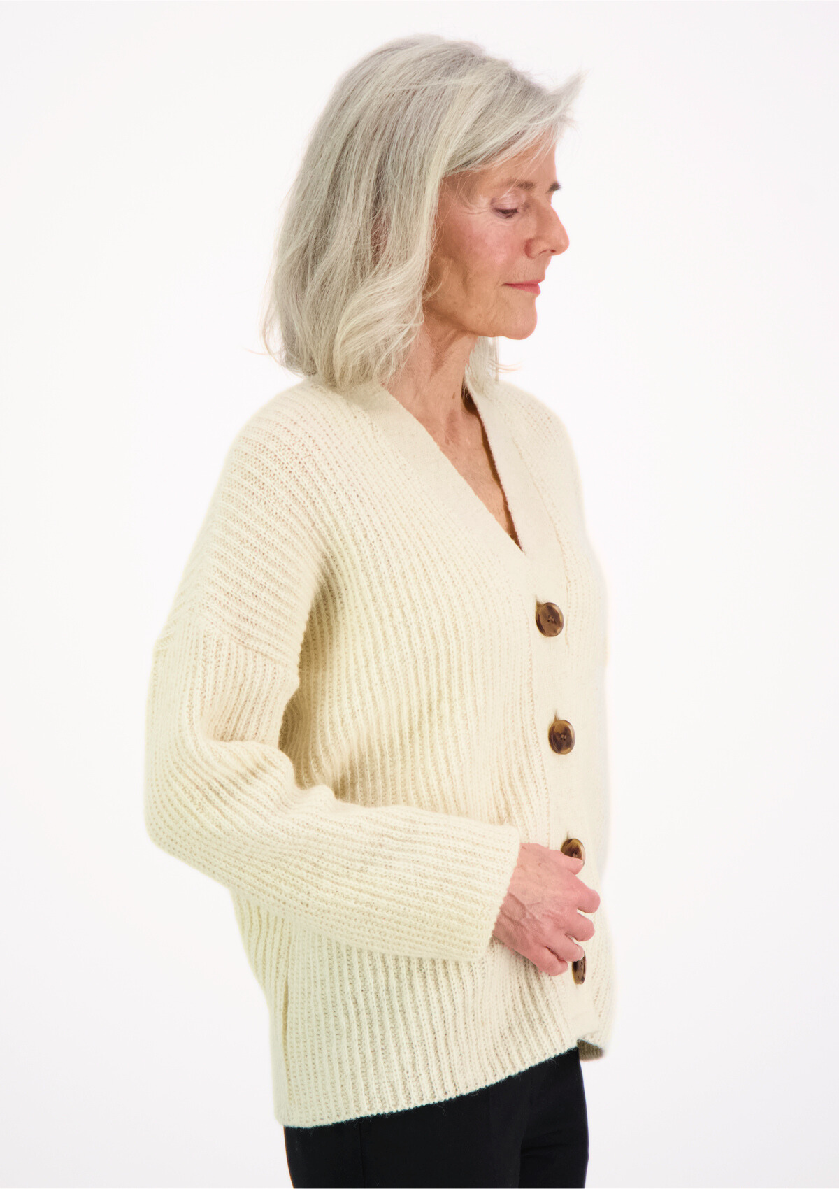 White ribbed cardigan made in Finland from Finnish sheep wool. Sustainable and ethical.  