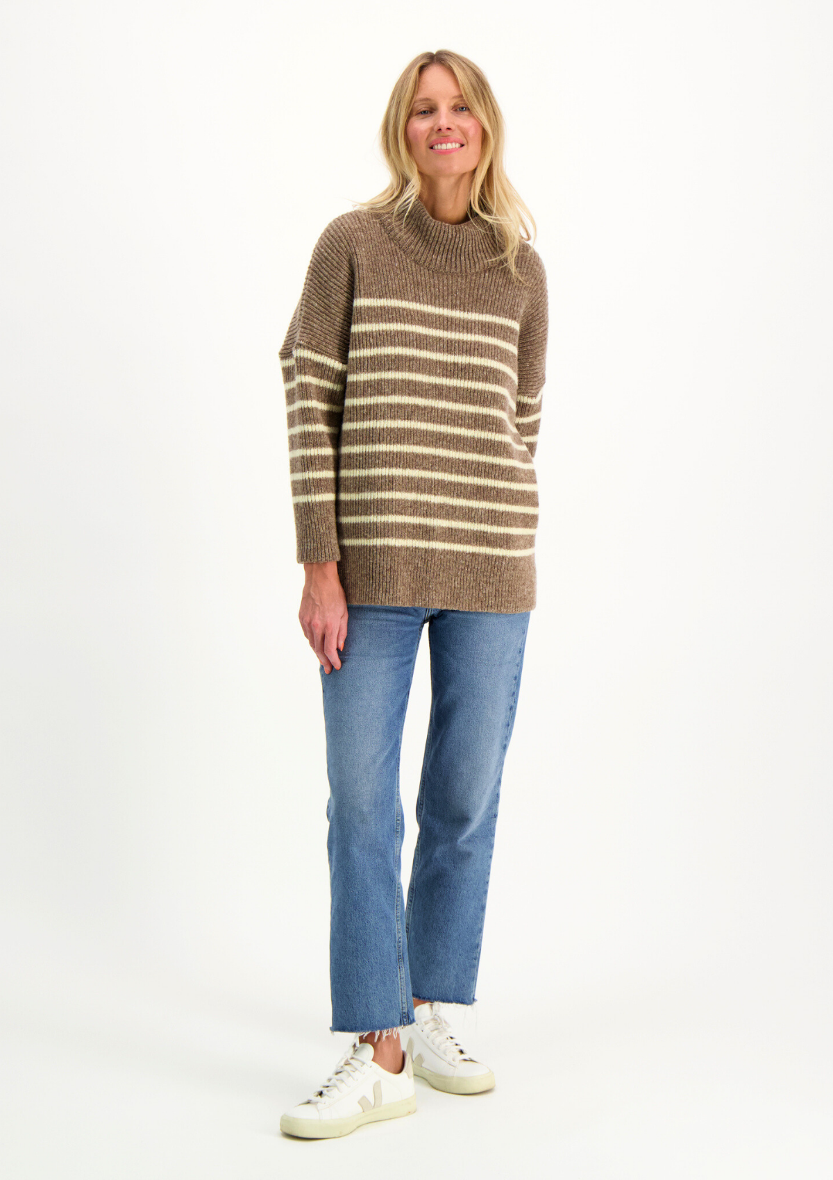 Turtleneck beige striped knit made of Finnish sheep wool and manufactured responsibly in Finland. Relaxed fit. 