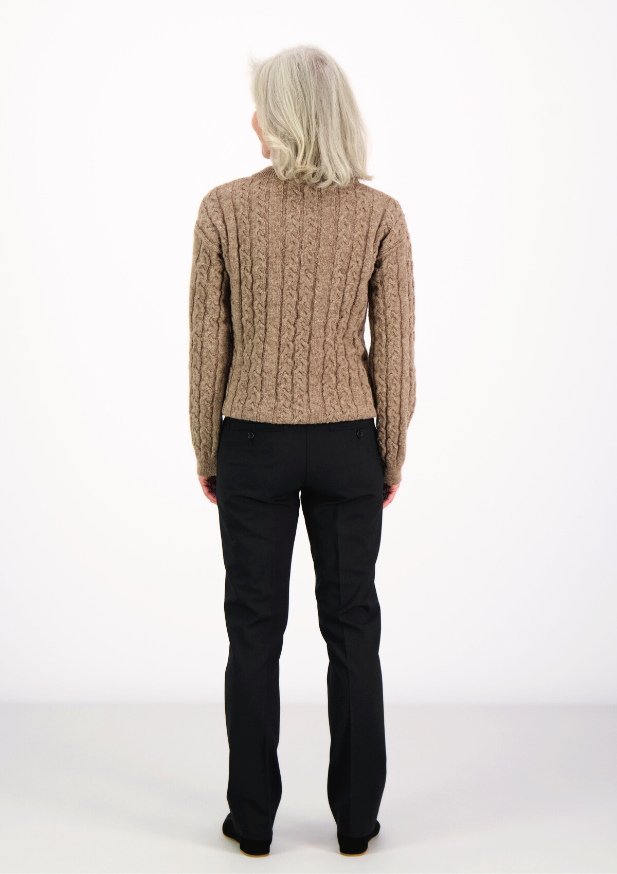 Soft and elegant cable knit in beige with o-neck. Made of responsible Finnish sheep wool in Finland. 